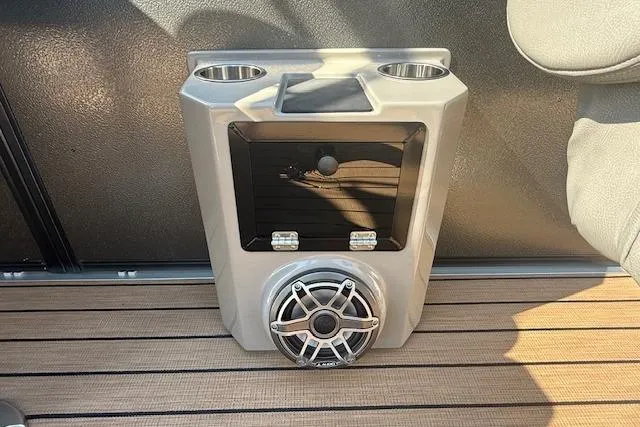 Slide: The Image of 2019 Premier 260 Grand Entertainer boat speaker system with cup holders on deck. - 18