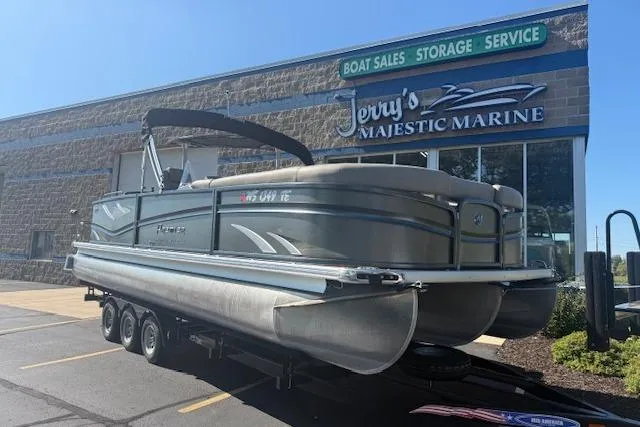 Slide: The Image of 2019 Premier 260 Grand Entertainer pontoon boat at Jerry's Majestic Marine dealership. - 2