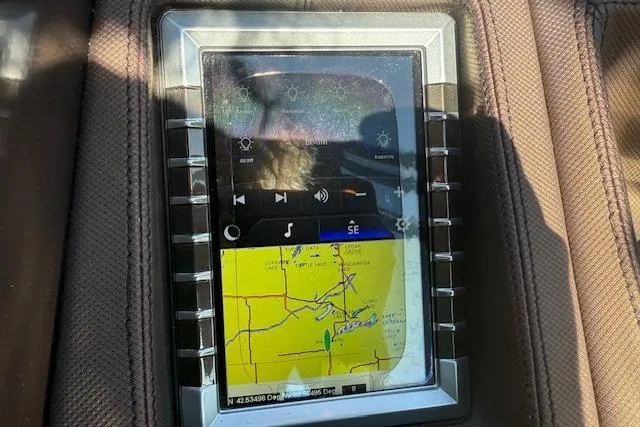 Slide: The Image of Touchscreen navigation system in a 2019 Premier 260 Grand Entertainer boat. - 27