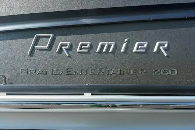 Slide: The Image of 2019 Premier 260 Grand Entertainer logo on a sleek metallic surface. - 29