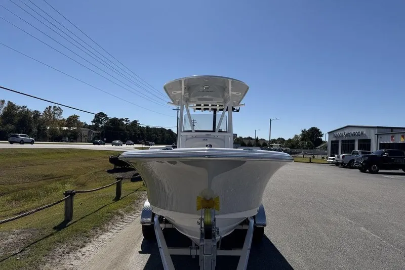 Slide: The Image of 2026 Sea Hunt Ultra 235 SE boat with Yamaha engine on trailer. - 6