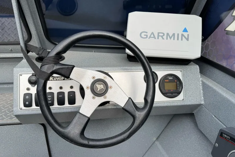 Slide: The Image of Steering console of 2014 KingFisher 1625 Falcon XL with Garmin navigation system. - 11