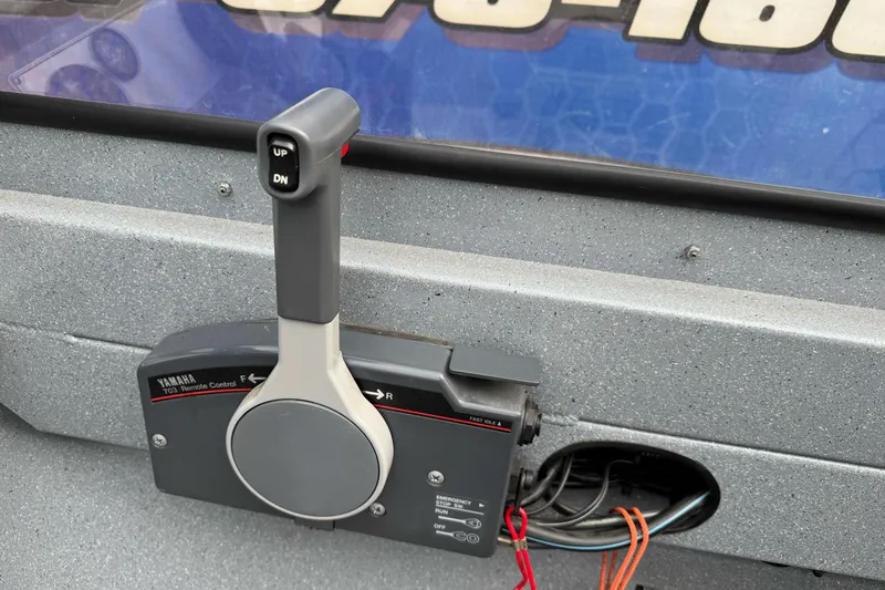 Slide: The Image of Yamaha 703 remote control on 2014 KingFisher 1625 Falcon XL boat dashboard. - 12