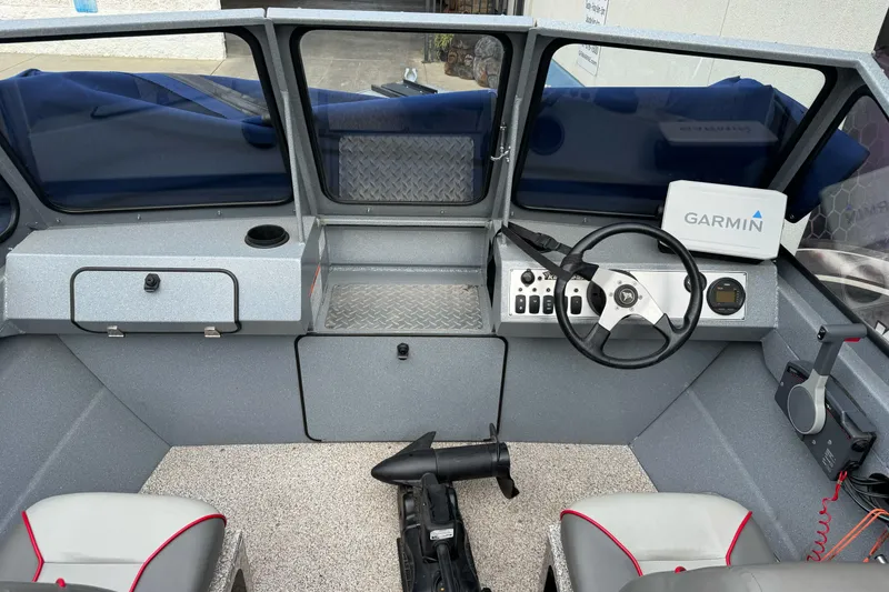 Slide: The Image of Interior of a 2014 KingFisher 1625 Falcon XL boat with Garmin navigation system. - 7