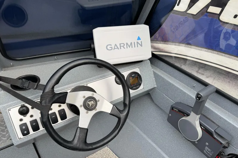 Slide: The Image of Steering console of 2014 KingFisher 1625 Falcon XL with Garmin navigation system. - 8