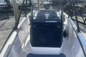 Slide: The Image of 2022 Axopar 22 TT boat interior with sleek design and modern features. - 9