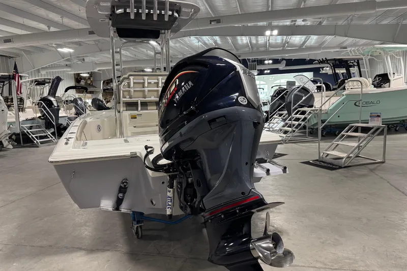 Slide: The Image of 2026 Key West 230 Bay Reef boat with Yamaha outboard motor in showroom. - 3