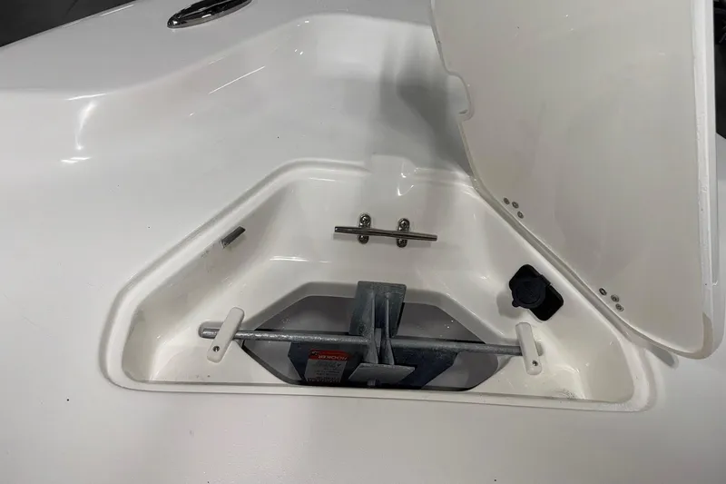 Slide: The Image of Open anchor compartment on 2026 Key West 230 Bay Reef boat. - 6
