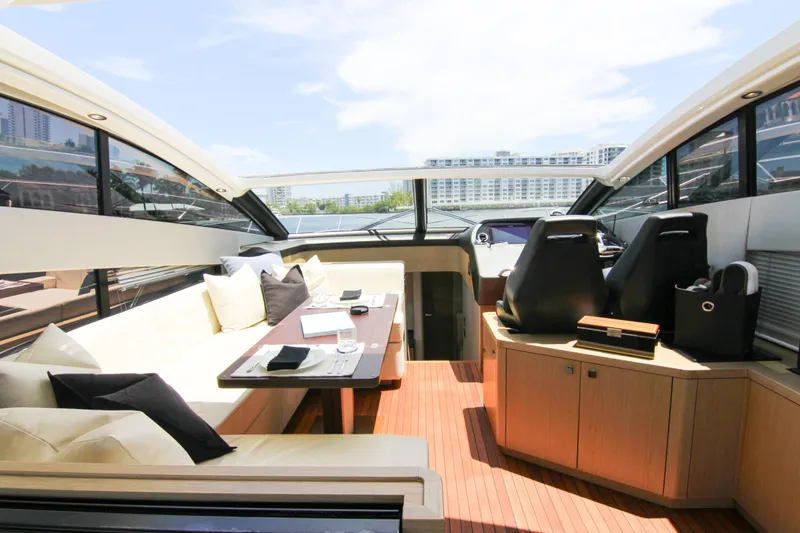 Slide: The Image of Luxurious interior of 2017 Sunseeker Predator 57 yacht with elegant seating and helm. - 25