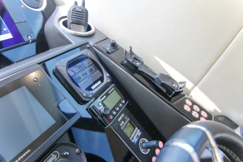 Slide: The Image of Control panel of a 2017 Sunseeker Predator 57 yacht with navigation equipment. - 30