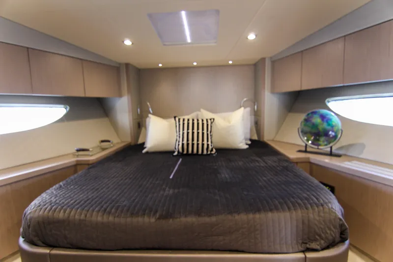 Slide: The Image of Luxurious bedroom interior of 2017 Sunseeker Predator 57 yacht with modern decor. - 39