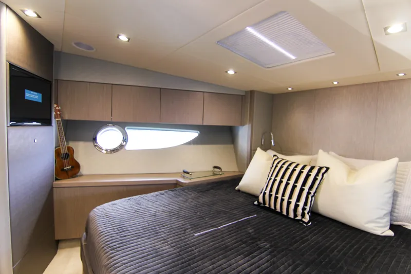 Slide: The Image of Luxurious bedroom interior of 2017 Sunseeker Predator 57 yacht with modern decor. - 41