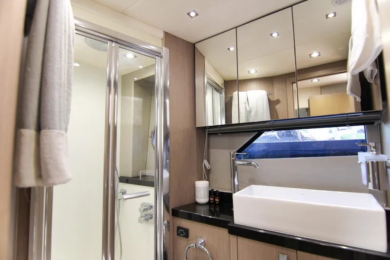 Slide: The Image of Luxurious bathroom in 2017 Sunseeker Predator 57 yacht with modern fixtures and elegant design. - 43