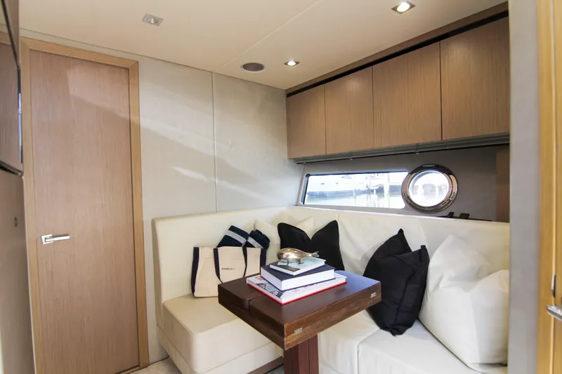 Slide: The Image of Luxurious interior of 2017 Sunseeker Predator 57 yacht with cozy seating and elegant decor. - 49