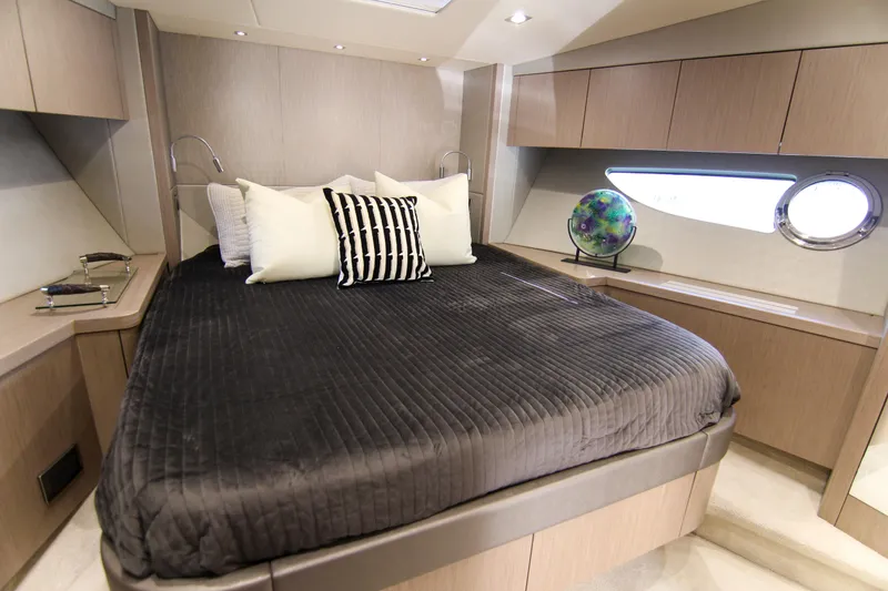 Slide: The Image of Luxurious bedroom interior of 2017 Sunseeker Predator 57 yacht with modern design elements. - 51
