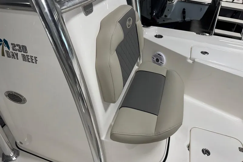 Slide: The Image of 2026 Key West 230 Bay Reef boat seat with logo, featuring sleek design and comfortable upholstery. - 9