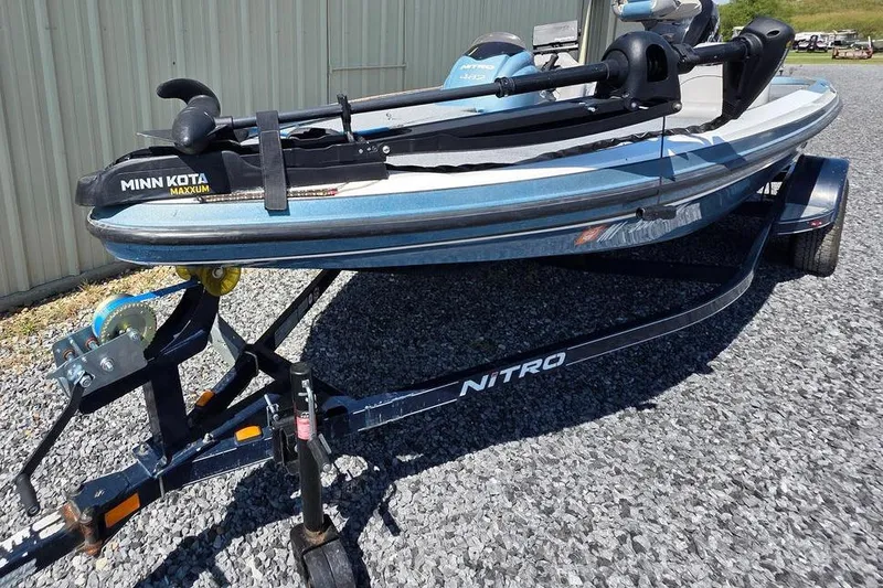 Slide: The Image of 2008 Nitro 482 DC boat on trailer with Minn Kota Maxxum motor. - 3