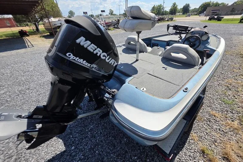 Slide: The Image of 2008 Nitro 482 DC boat with Mercury OptiMax engine on gravel lot. - 8
