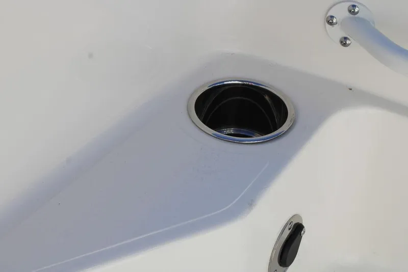 Slide: The Image of Cup holder on 2026 Skeeter SX221 boat, featuring sleek white design. - 17