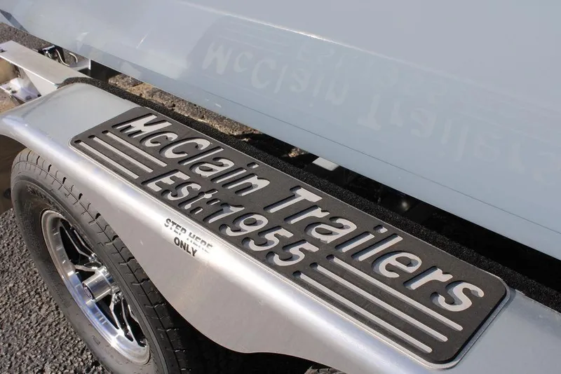 Slide: The Image of Trailer fender with "McClain Trailers Est. 1955" text, Skeeter SX221, 2026 model. - 4
