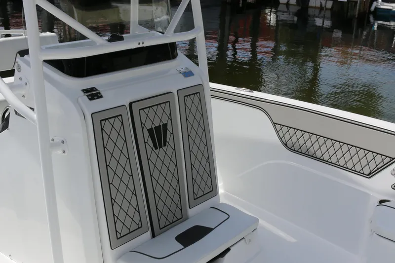 Slide: The Image of 2026 Wellcraft 202 Fisherman boat interior with sleek seating and modern design. - 12