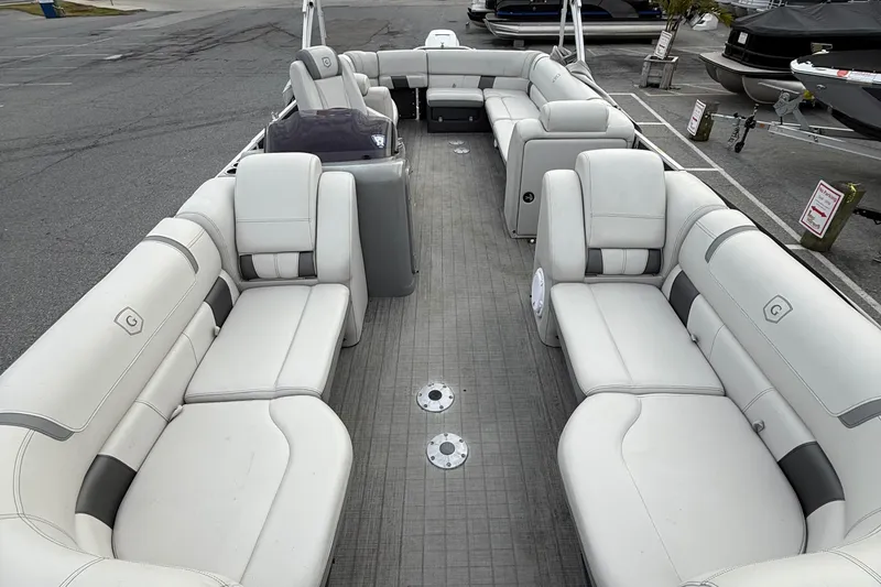 Slide: The Image of 2020 Godfrey AquaPatio 255 UL pontoon boat with spacious white seating and modern design. - 9