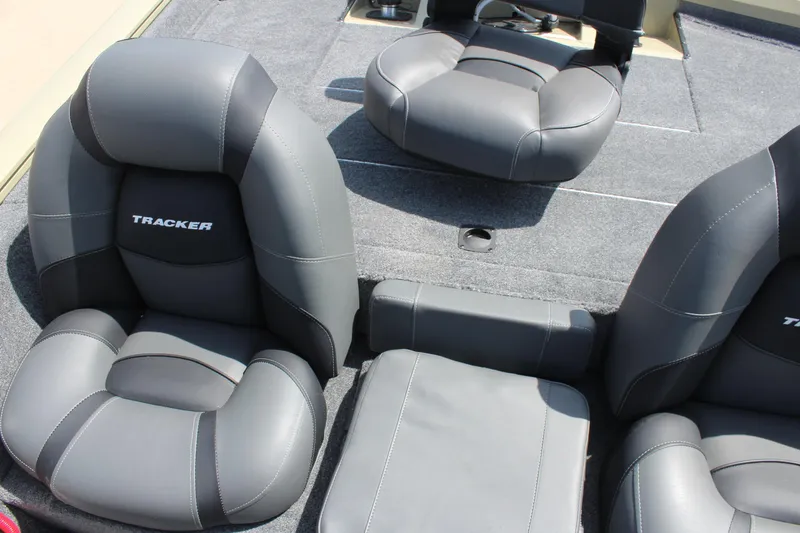 Slide: The Image of 2026 Tracker Pro Team 175 boat interior with gray cushioned seats. - 11