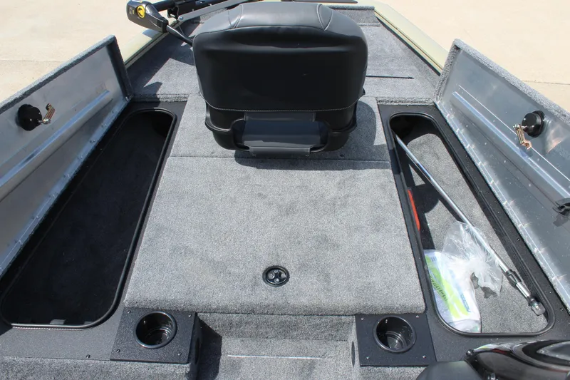 Slide: The Image of 2026 Tracker Pro Team 175 boat interior with storage compartments and seating. - 14