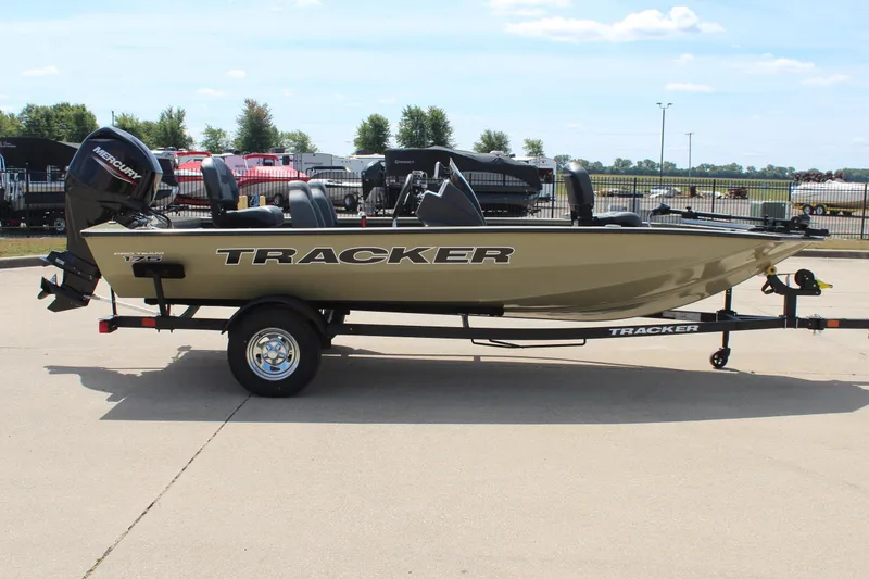 Slide: The Image of 2026 Tracker Pro Team 175 boat on trailer, parked outdoors. - 4