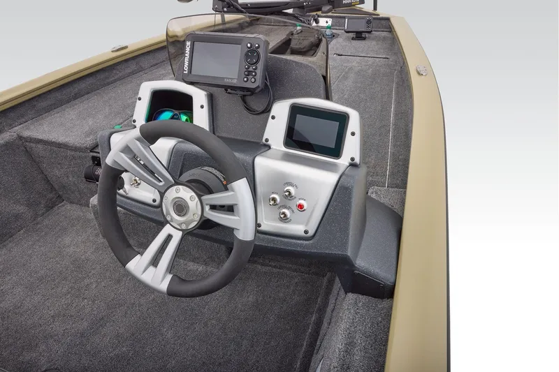 Slide: The Image of Manufacturer Provided Image: 2026 Tracker Pro Team 175 boat dashboard with steering wheel and electronic displays. - 45