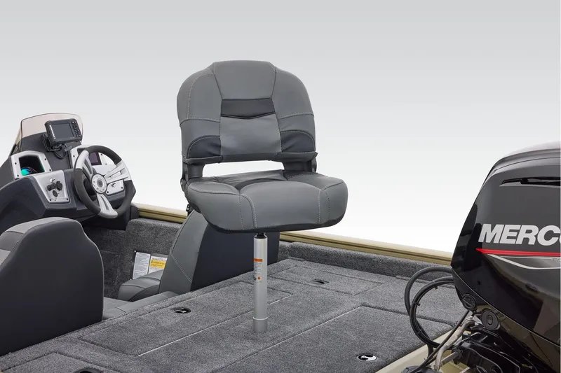 Slide: The Image of Manufacturer Provided Image: 2026 Tracker Pro Team 175 boat interior with steering console and Mercury engine. - 55