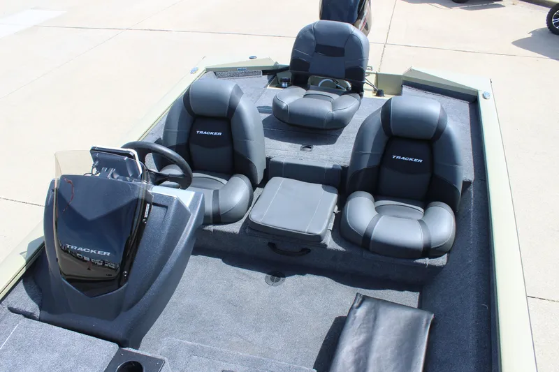 Slide: The Image of 2026 Tracker Pro Team 175 boat interior with seating and steering console. - 8