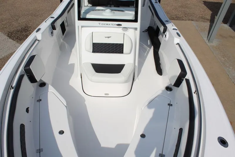 Slide: The Image of 2026 Tidewater 220 CC Adventure boat interior with sleek seating and modern design. - 21