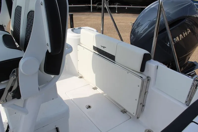 Slide: The Image of 2026 Tidewater 220 CC Adventure boat interior with Yamaha engine, featuring sleek seating. - 3