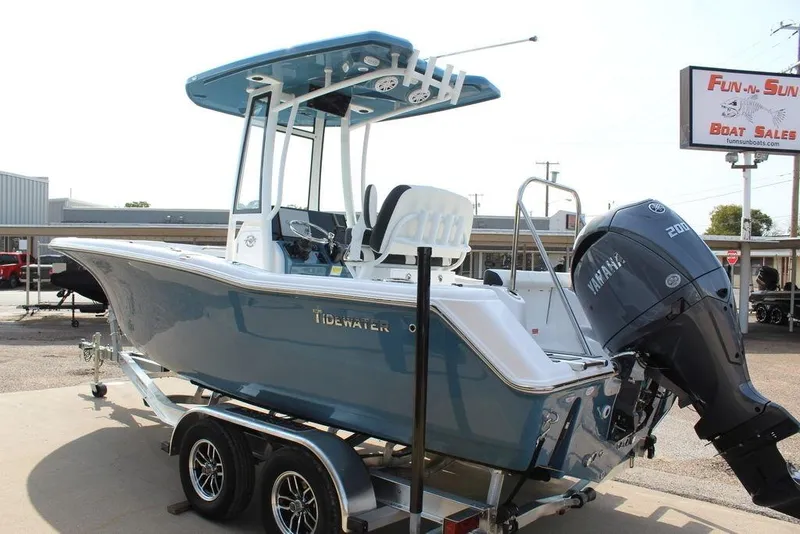 Slide: The Image of 2026 Tidewater 220 CC Adventure boat on trailer, featuring Yamaha 200 engine. - 4