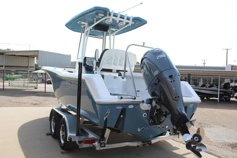 Slide: The Image of 2026 Tidewater 220 CC Adventure boat on trailer, featuring a powerful 200 HP outboard motor. - 6