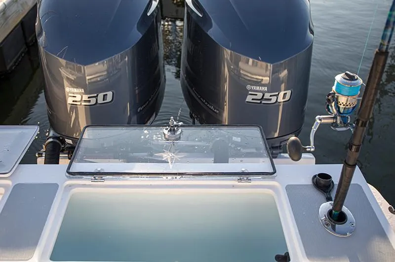Slide: The Image of Manufacturer Provided Image: NorthCoast 255 HT 2026 boat with dual Yamaha 250 engines and fishing gear. - 10