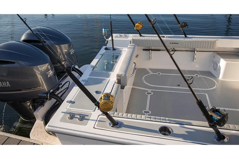 Slide: The Image of Manufacturer Provided Image: 2026 NorthCoast 255 HT boat with fishing rods and dual Yamaha engines. - 8
