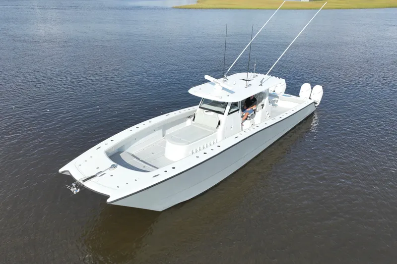 Slide: The Image of 2022 Freeman 47 boat on calm water, aerial view. - 16