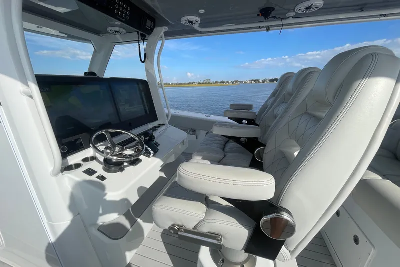 Slide: The Image of Luxurious interior of 2022 Freeman 47 boat with plush seating and advanced controls. - 32