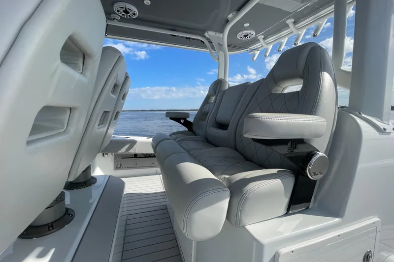 Slide: The Image of Luxurious seating on 2022 Freeman 47 boat with ocean view and blue sky. - 33
