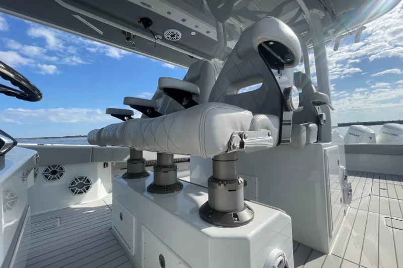 Slide: The Image of Luxury seating on a 2022 Freeman 47 boat, featuring sleek design and ocean backdrop. - 34