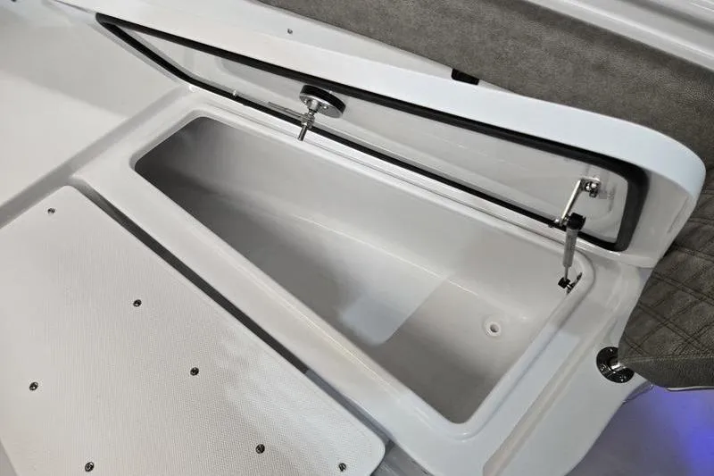Slide: The Image of Open storage compartment on 2026 Sea Hunt Ultra 285 SE boat. - 25