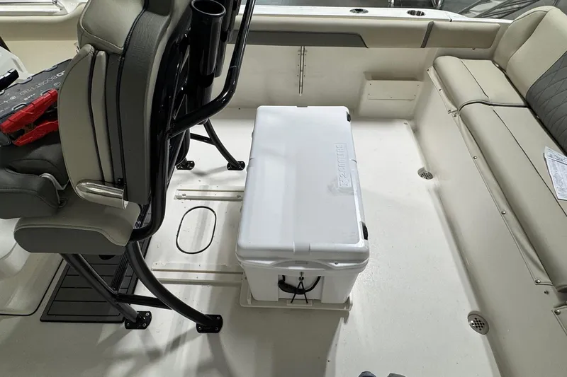 Slide: The Image of Interior of 2026 Key West 239 FS boat with seating and cooler. - 16
