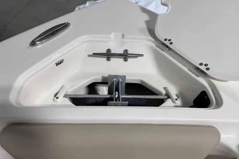 Slide: The Image of Anchor compartment of 2026 Key West 239 FS boat, featuring a secure anchor storage. - 6