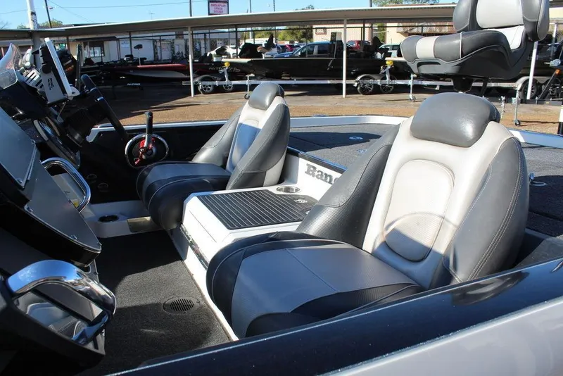 Slide: The Image of 2019 Ranger Z521 Comanche boat interior with dual seats and steering console. - 11