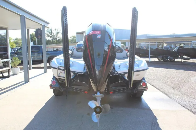 Slide: The Image of 2019 Ranger Z521 Comanche boat rear view with motor and propeller. - 5