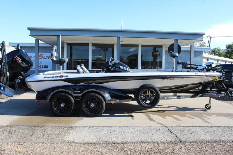 Slide: The Image of 2019 Ranger Z521 Comanche boat on trailer outside dealership. - 6