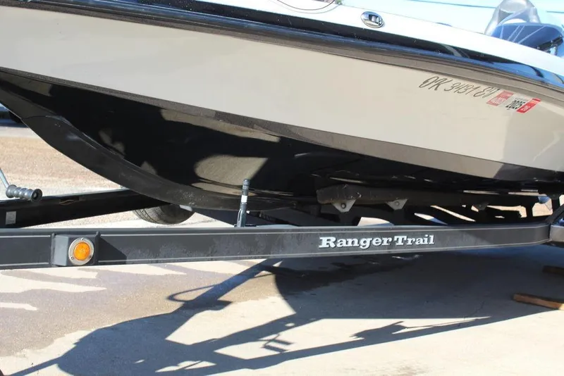 Slide: The Image of 2019 Ranger Z521 Comanche boat on Ranger Trail trailer, side view. - 7
