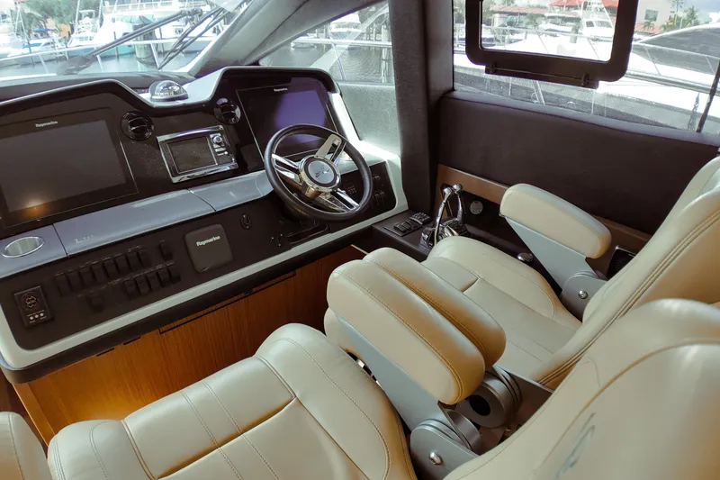 Slide: The Image of Luxurious interior of 2016 Sea Ray L590 Fly yacht with plush leather seating. - 11